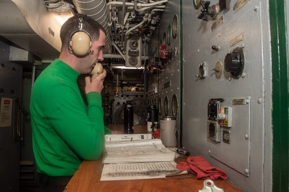 USS Ronald Reagan (CVN 76) Sailor monitors the catapult launch system