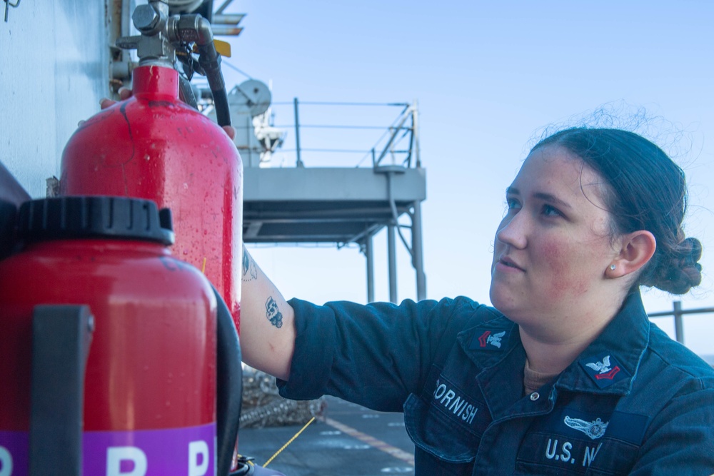 Boxer Sailor Maintains Firefighting Equipment