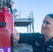 Boxer Sailor Maintains Firefighting Equipment