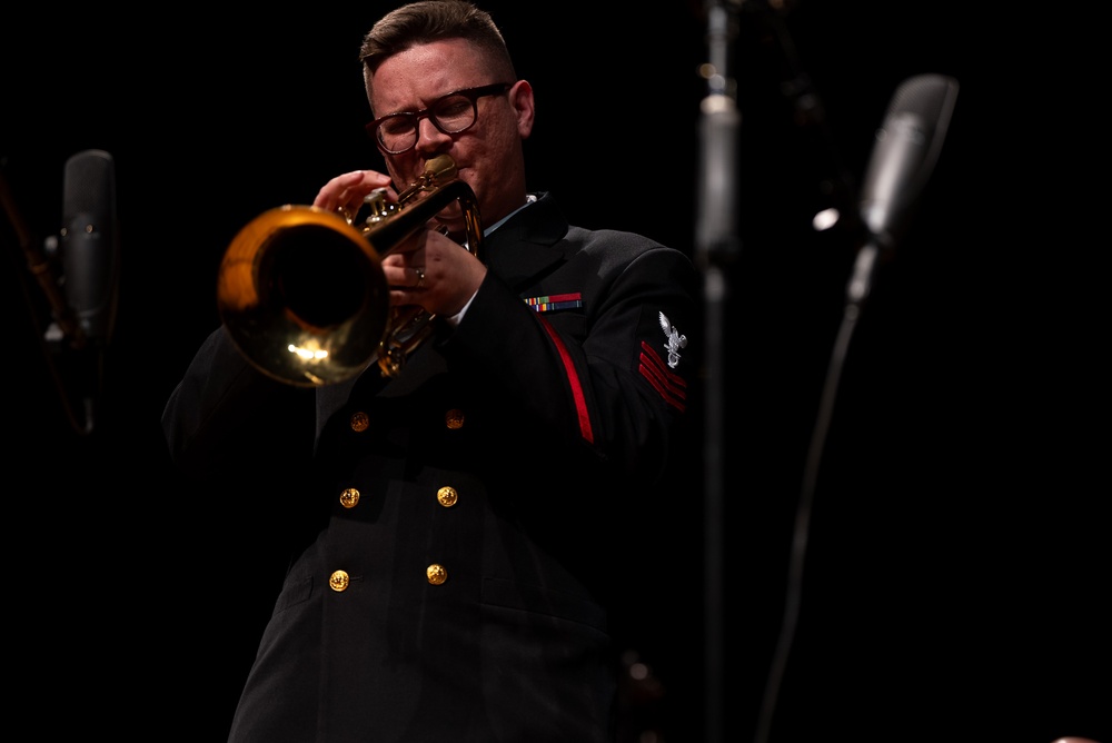 Musician 1st Class David Kapral performs on the Bass Trumpet