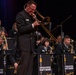 Musician 1st Class Benjamin Ford performs a trombone solo