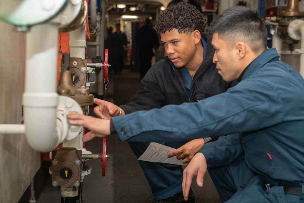 Boxer Sailors Perform Preventative Maintenance at Sea