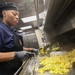 USS Dewey (DDG 105) Culinary Specialists Work in the Ship's Galley