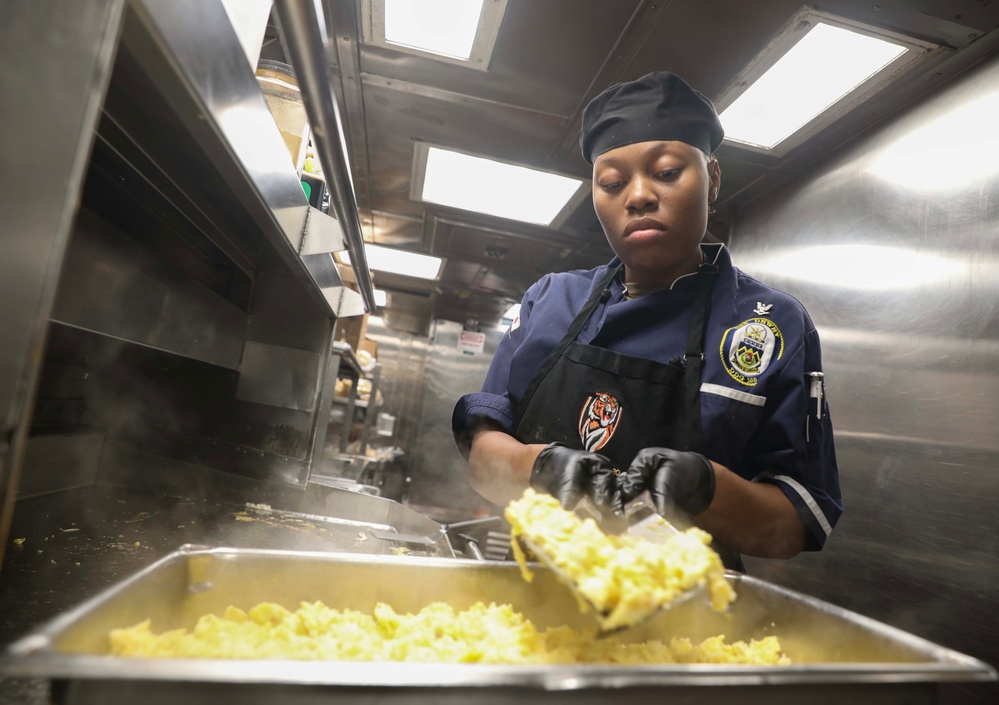 USS Dewey (DDG 105) Culinary Specialists Work in the Ship's Galley