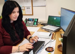 Linguistics scholar who volunteer interprets at local events selected as LRC Italy employee of the quarter