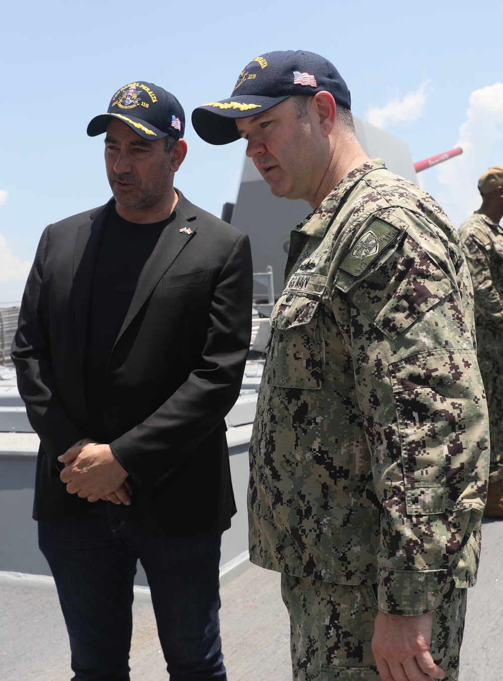 Jonathan Kaplan, U.S. Ambassador to Singapore, and other distinguished guests visit the Arleigh Burke-class guided-missile destroyer USS Rafael Peralta (DDG 115)