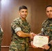 Staff Sgt. Jairo Echeverry receives Navy and Marine Corps Commendation Medal