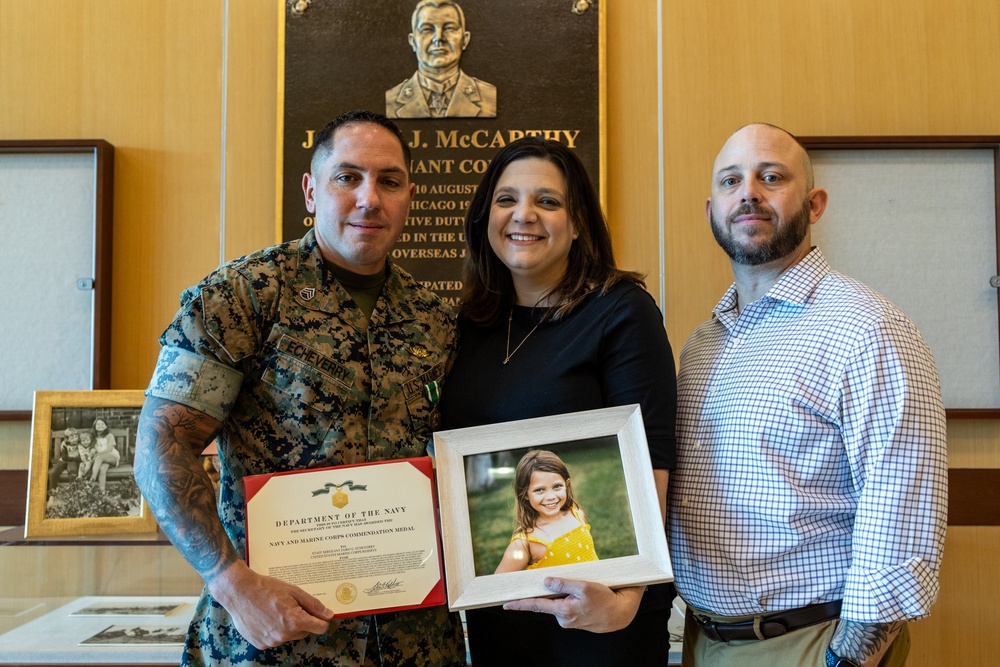 Staff Sgt. Jairo Echeverry receives Navy and Marine Corps Commendation Medal