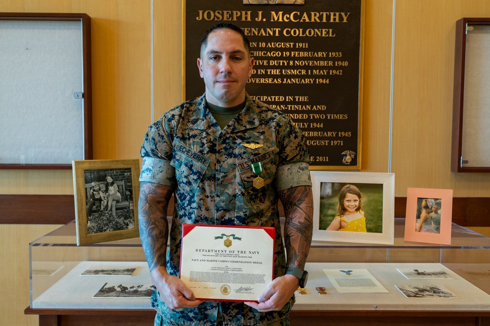 Staff Sgt. Jairo Echeverry receives Navy and Marine Corps Commendation Medal