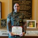 Staff Sgt. Jairo Echeverry receives Navy and Marine Corps Commendation Medal