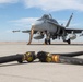 U.S. Marines perform an air delivery ground refueling on F/A-18 Hornet aircraft