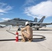 U.S. Marines perform an air delivery ground refueling on F/A-18 Hornet aircraft