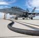 U.S. Marines perform an air delivery ground refueling on F/A-18 Hornet aircraft