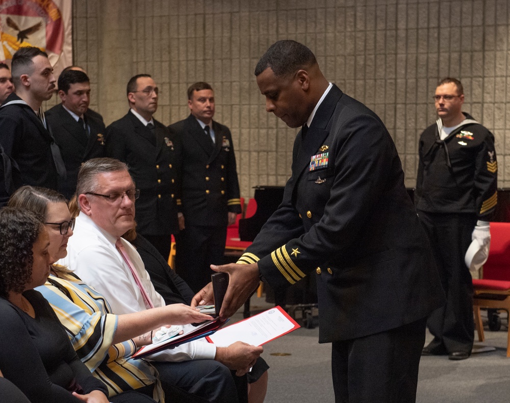 USS Nebraska (Blue) crew and guests hold a memorial ceremony honoring the life of Missile Technician 2nd Class Larry J. Showell.