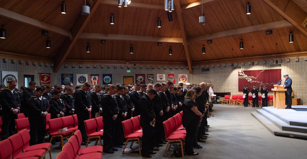 USS Nebraska (Blue) crew and guests hold a memorial ceremony honoring the life of Missile Technician 2nd Class Larry J. Showell.