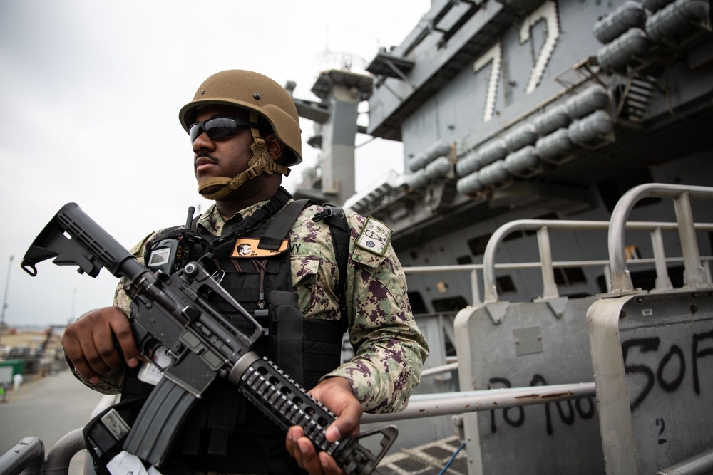 Abraham Lincoln security team stands watch during Force Protection Condition Charlie