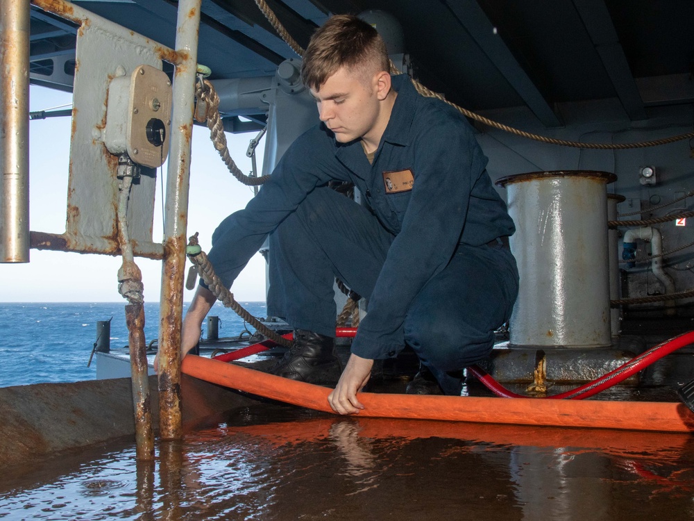 Abraham Lincoln conducts firemain hose maintenance