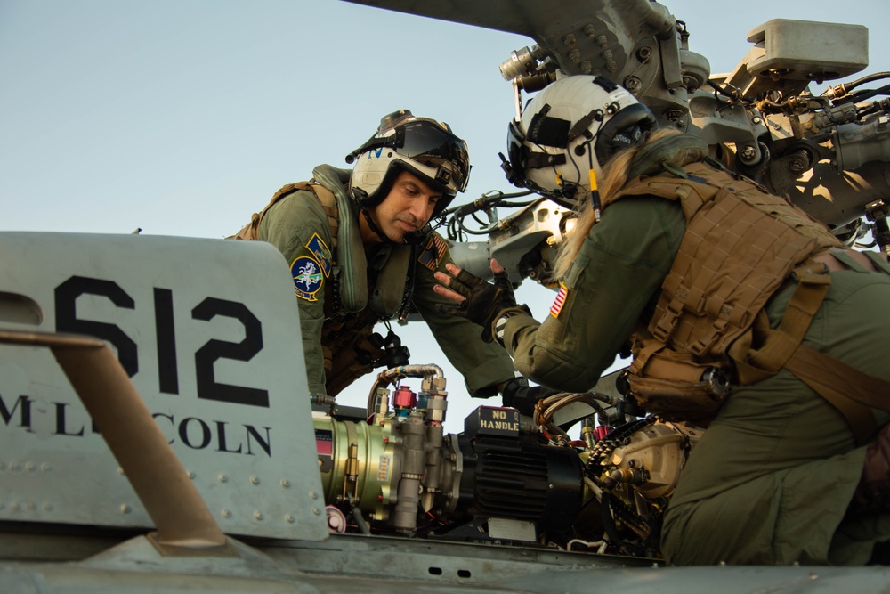 HSC-14 Sailors conduct pre-flight check