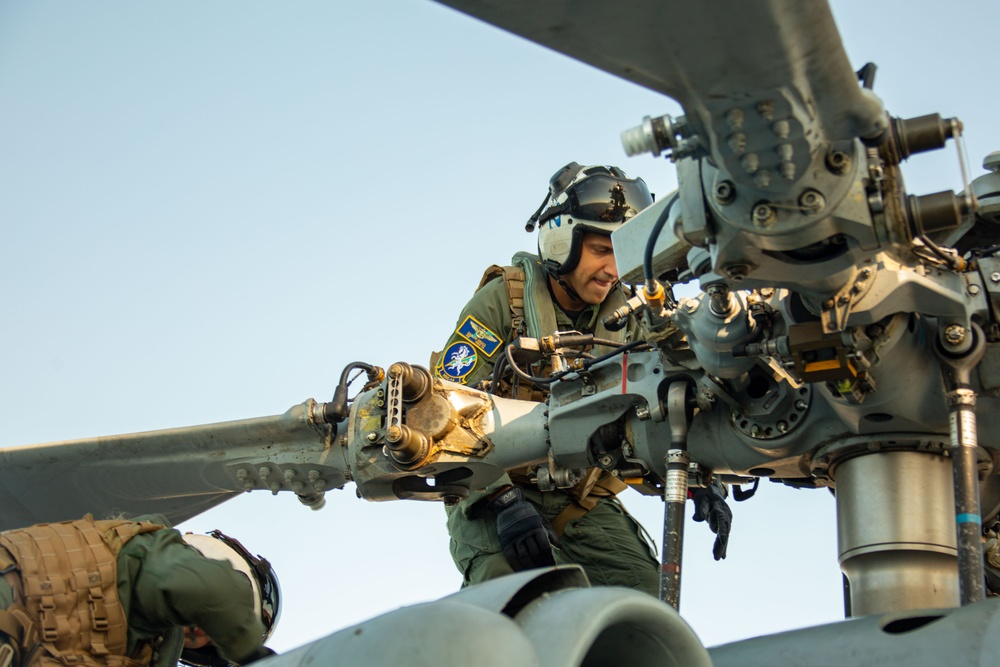 HSC-14 Sailor conducts pre-flight check