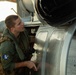 HSC-14 Sailor conducts pre-flight check