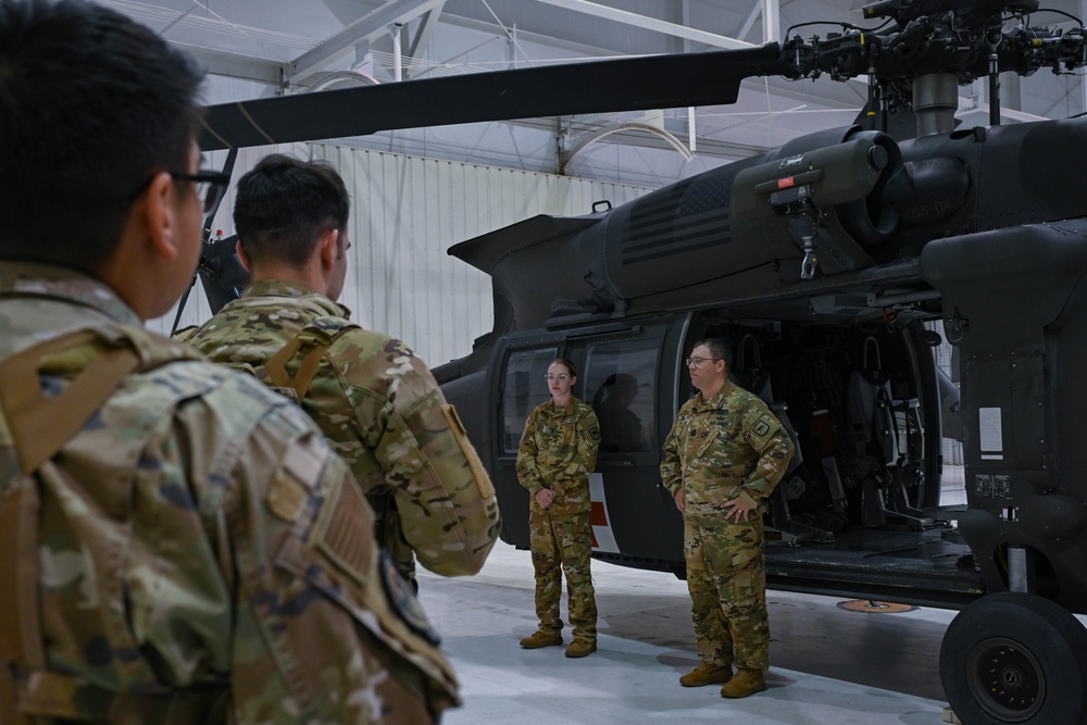 Ellsworth Airmen train with Local Army National Guard on helicopter medical evacuation procedures