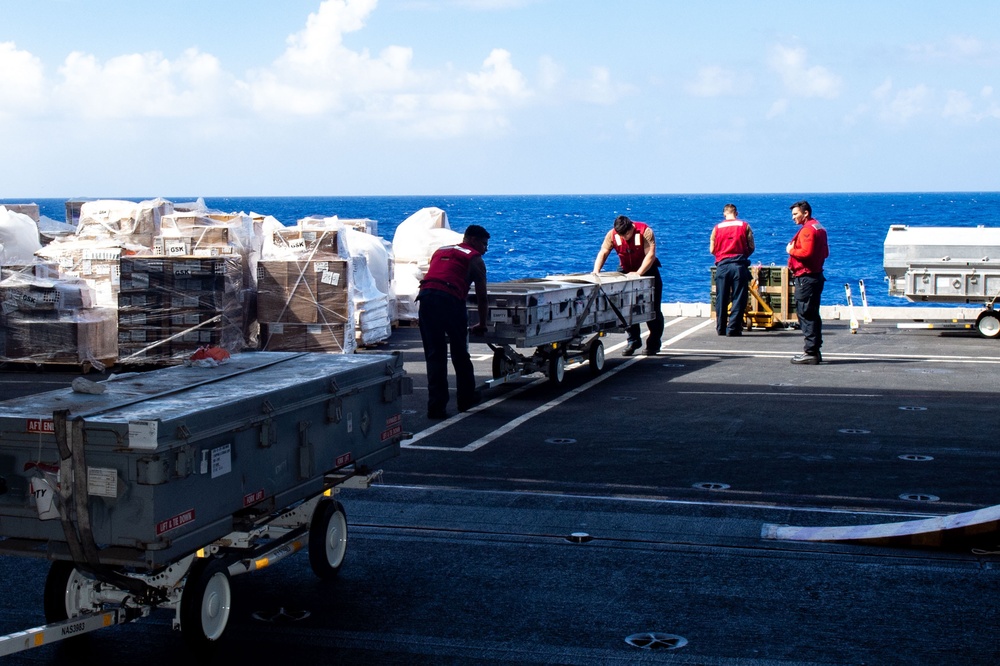 USS Ronald Reagan (CVN 76) conducts replenishment-at-sea with USNS Carl Brashear (T-AKE 7)