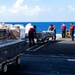 USS Ronald Reagan (CVN 76) conducts replenishment-at-sea with USNS Carl Brashear (T-AKE 7)