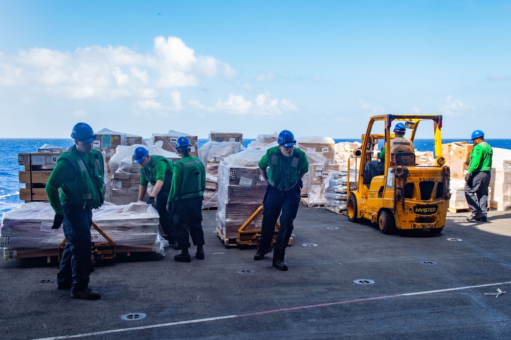 USS Ronald Reagan (CVN 76) conducts replenishment-at-sea with USNS Carl Brashear (T-AKE 7)