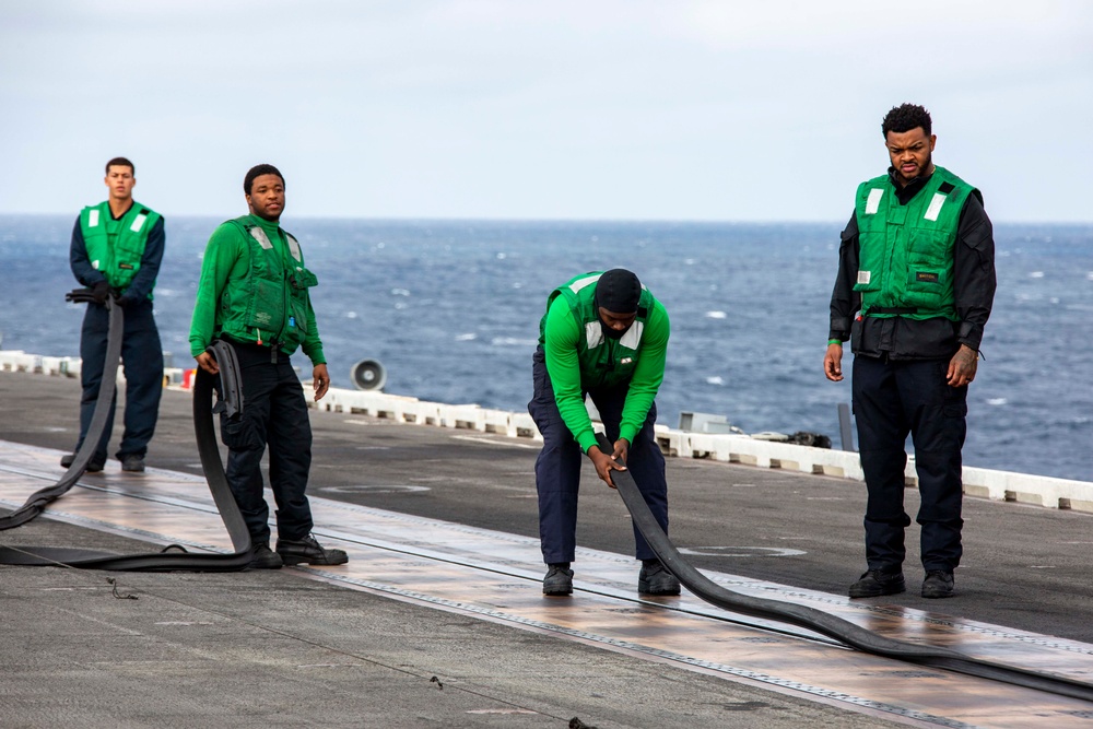 Abraham Lincoln Sailors secure a catapult