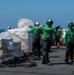 USS Ronald Reagan (CVN 76) conducts replenishment-at-sea with USNS Carl Brashear (T-AKE 7)