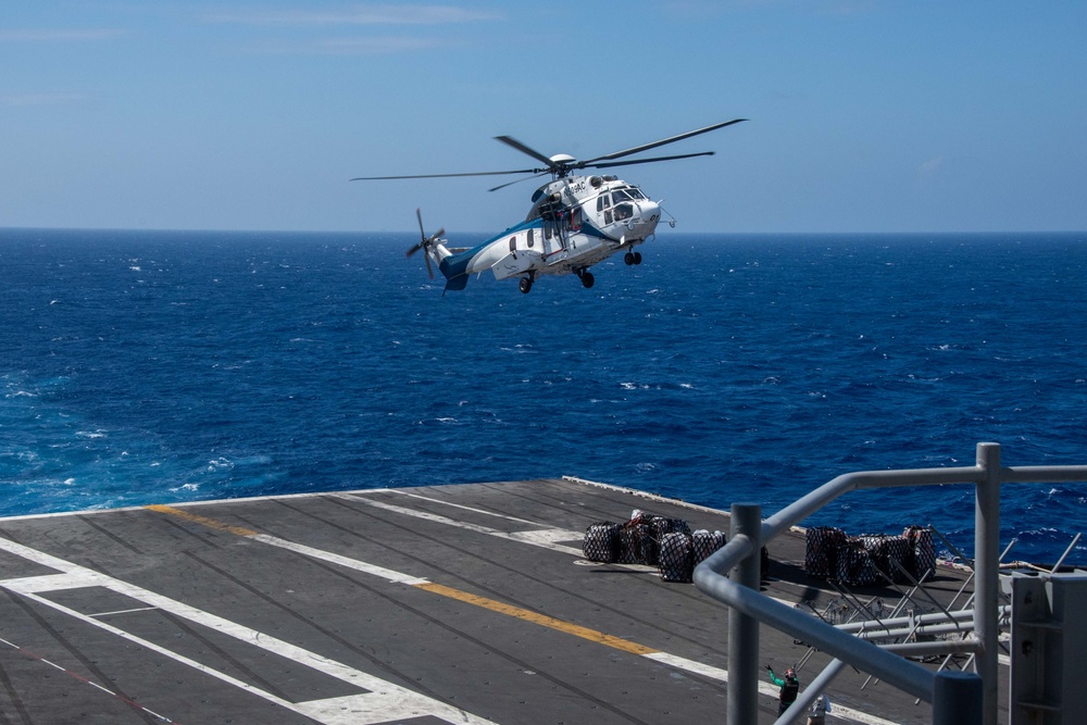 USS Ronald Reagan (CVN 76) conducts replenishment-at-sea with USNS Carl Brashear (T-AKE 7)
