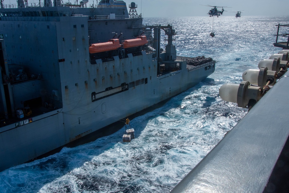 USS Ronald Reagan (CVN 76) conducts replenishment-at-sea with USNS Carl Brashear (T-AKE 7)
