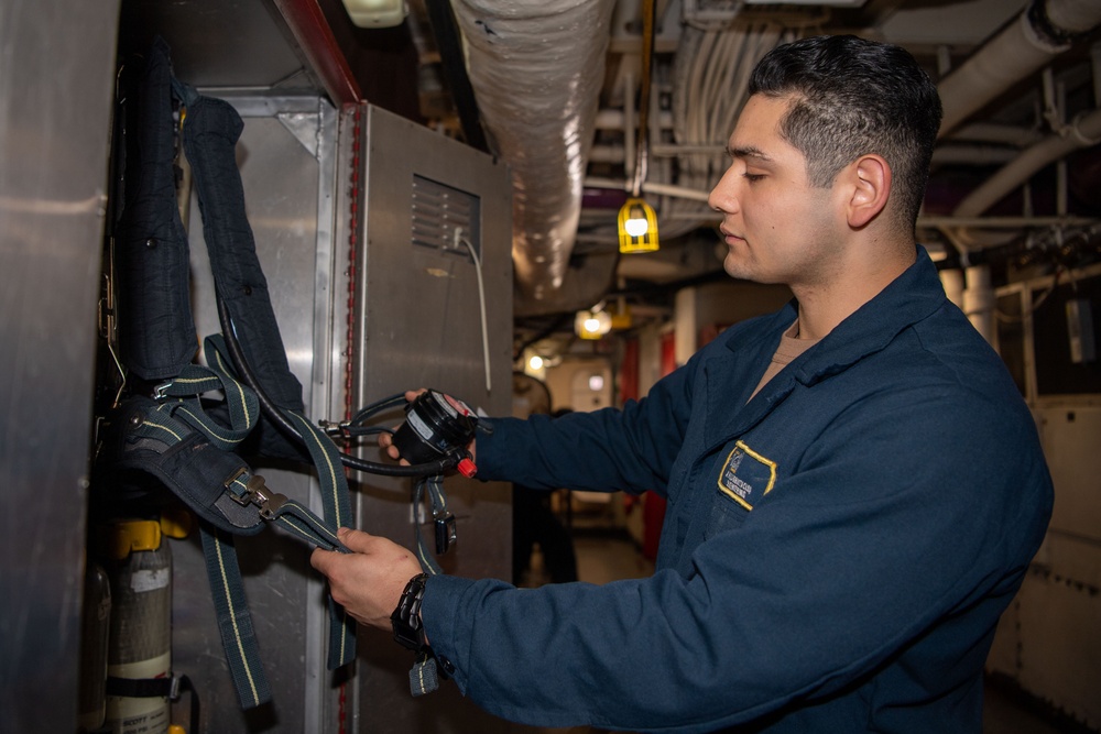 Sailor Conducts Maintenance