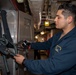 Sailor Conducts Maintenance