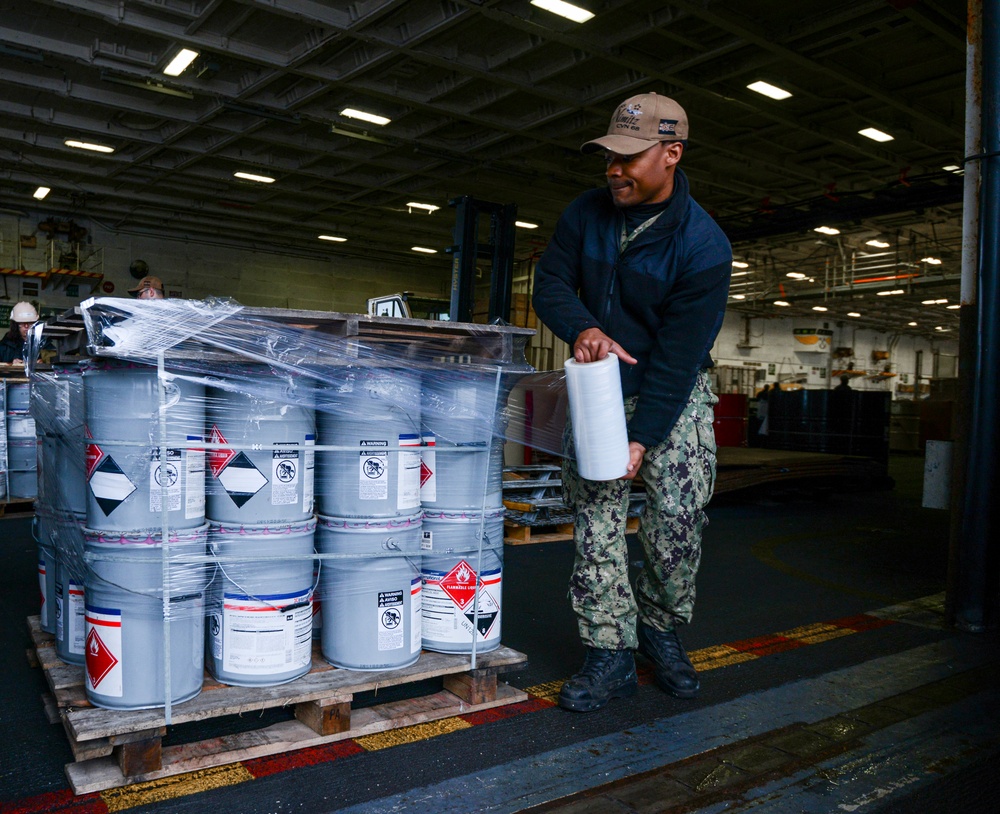 U.S. Navy Sailor Packs Cargo