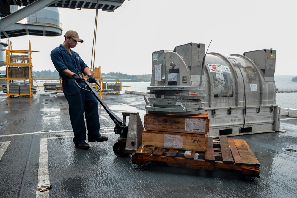 U.S. Navy Sailor Moves Cargo