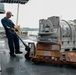 U.S. Navy Sailor Moves Cargo