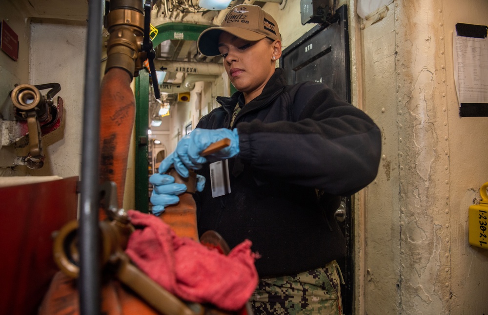 U.S. Navy Sailor Performs Maintenance On Fire Station