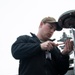 U.S. Navy Sailor Checks Deckhead Lights