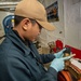 U.S. Navy Sailor Does Maintenance