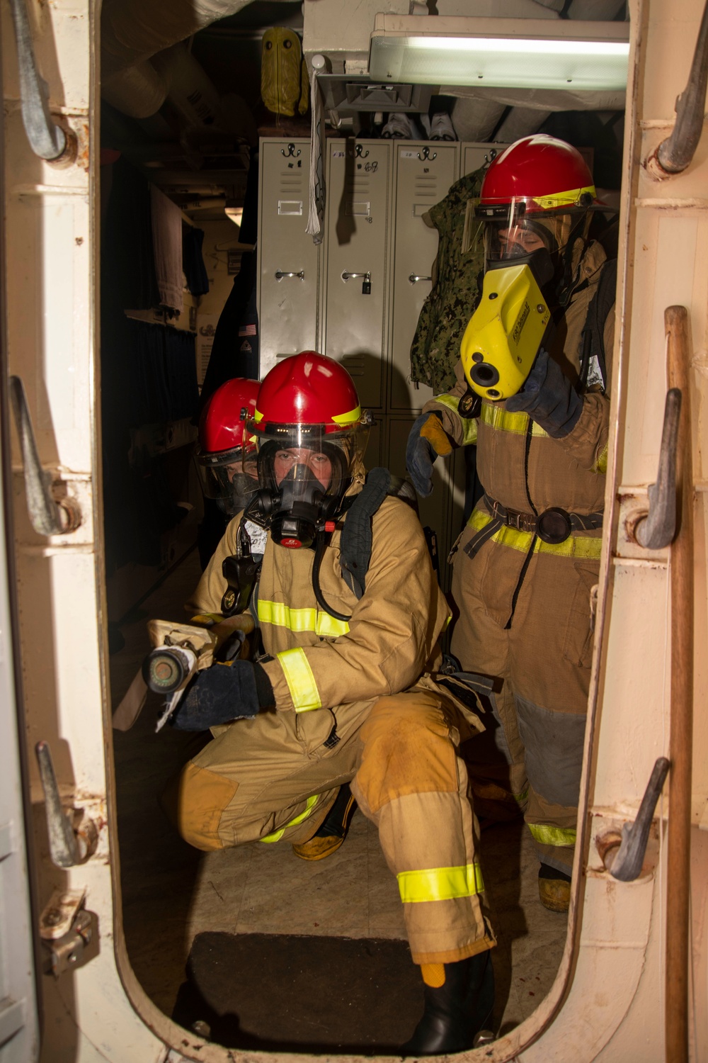 Sailors Man Firehose During Drill