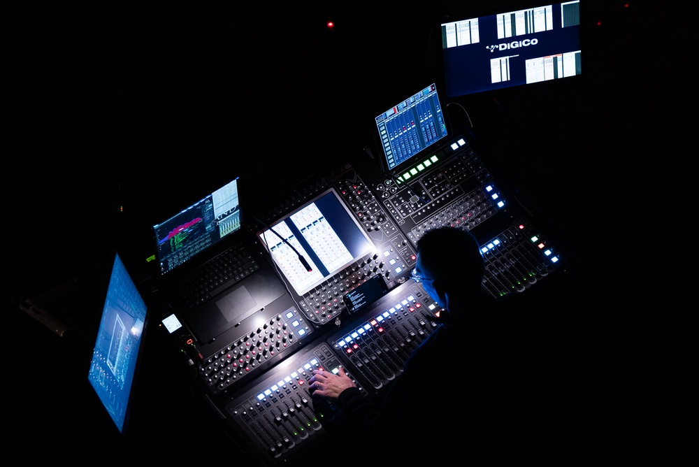 Musician 1st Class David Angell mans the soundboard at Troy University