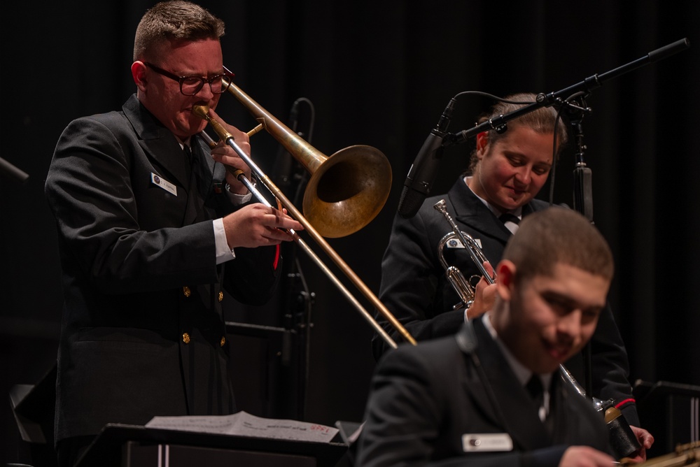 Musician 1st Class David Kapral performs a trombone solo at Troy University