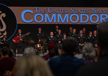 The US Navy Band Commodores receive a standing ovation at Pace Assembly of God Church during the Commodores 2023 National Tour
