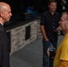 Chief Musician Jonathan Barnes speaks with a concert goer at Pace Assembly of God Church