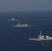 USS Gabrielle Giffords steams in formation with USS Dewey, JS Akebono