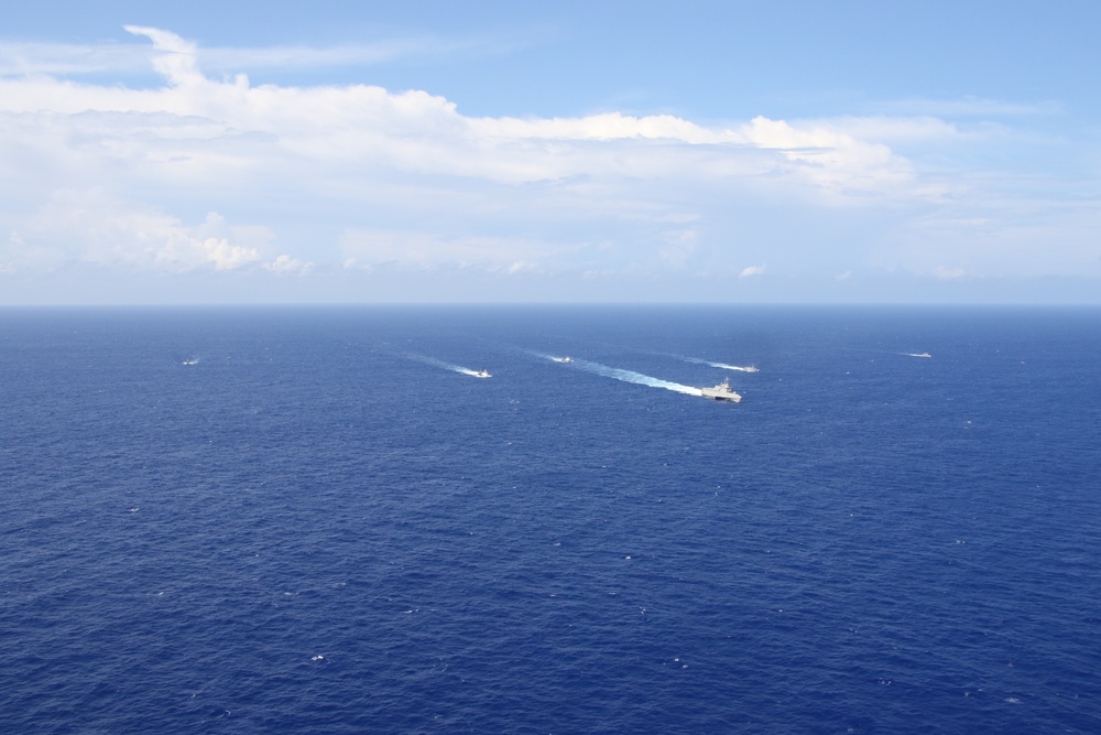 Unmanned Surface Vessels Steam with USS Oakland