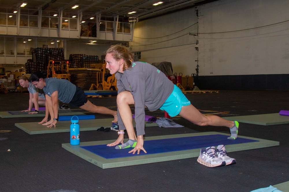 Yoga is taught on board USS Abraham Lincoln