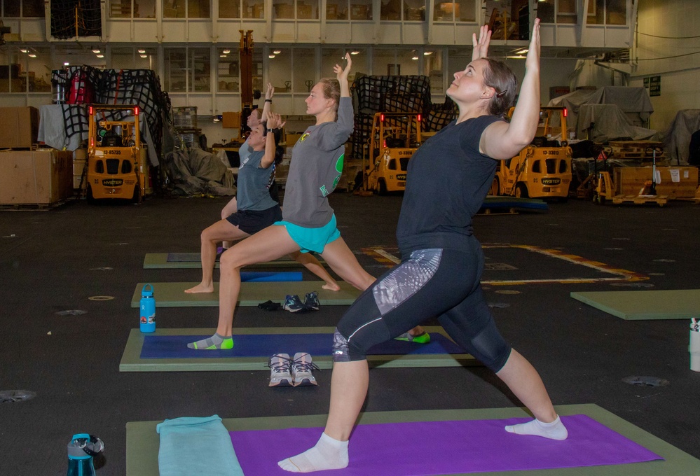 Yoga is taught on board USS Abraham Lincoln