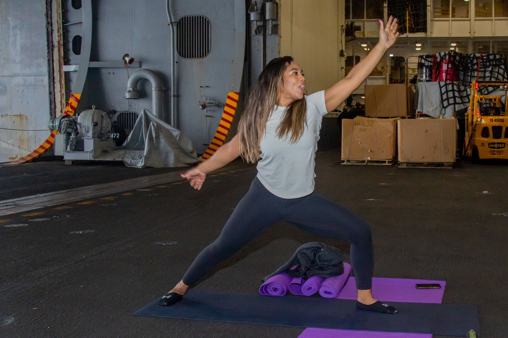 Yoga is taught on board USS Abraham Lincoln